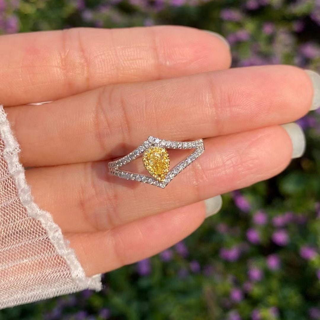 14k Gold 0.48 Ctw Natural Yellow Diamond & Diamond Ring: Ref:230968434 // gold content:14k gold // ring size:7. 25us // // main gemstone:yellow diamond // shape:pear // carat weight:0. 18ct // color:yellow // treatment:natural // // adjacent gemstone 2 :