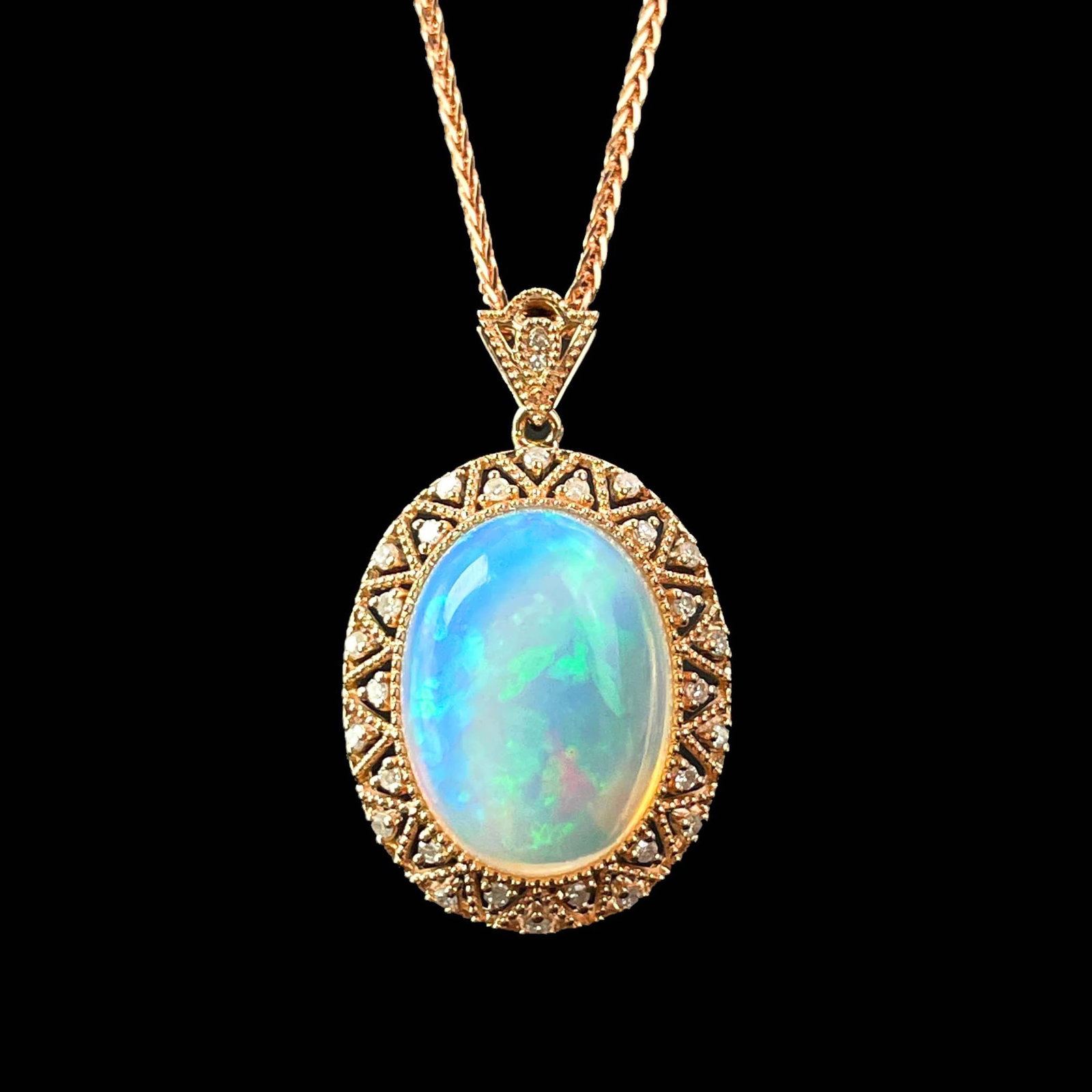 14k Gold 7.3 Ct Natural Opal & Diamond Pendant( Without Chain ): Ref:230969020 // gold content:14k gold // main gemstone:opal // shape:oval // carat weight:7. 3ct // color:white // treatment:natural // // adjacent gemstone 2 : diamond // shape:round // clarity grad