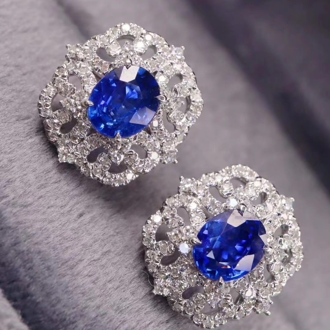 14k Gold 2.12 Ctw Natural Sapphire & Diamond Earrings: Ref:230969204 // gold content:14k gold // main gemstone:sapphire // shape:oval // carat weight:1. 6ct // color:royal blue // treatment:natural // // adjacent gemstone 2 : diamond // shape:round //