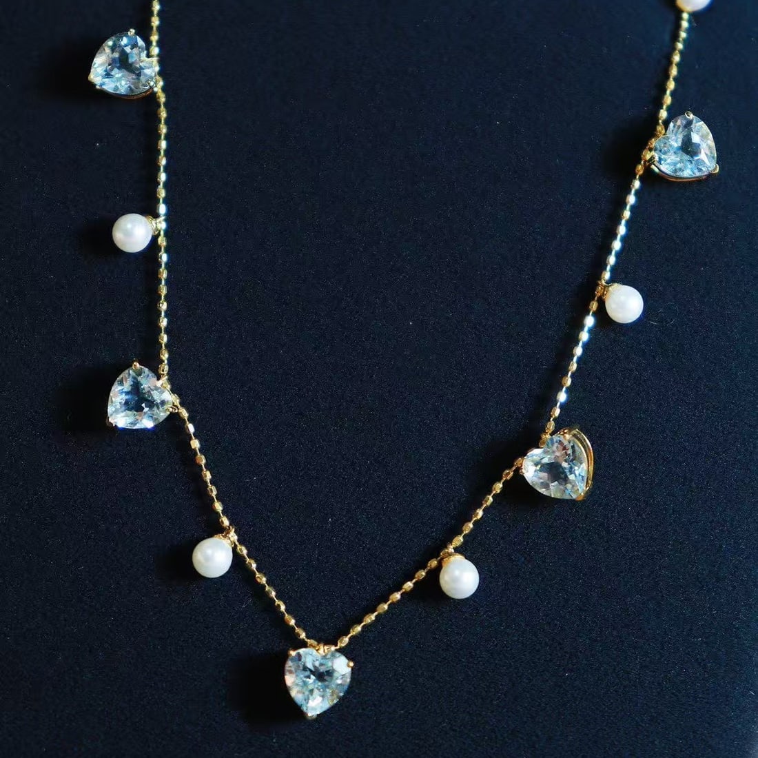 14k Gold 1.9 Ct Natural Aquamarine Necklace: Ref:230969142 // gold content:14k gold // main gemstone:aquamarine // shape:heart // carat weight:1. 9ct // color:blue // treatment:natural // Condition: New High Estimate: 2600 Low Estimate: 1800
