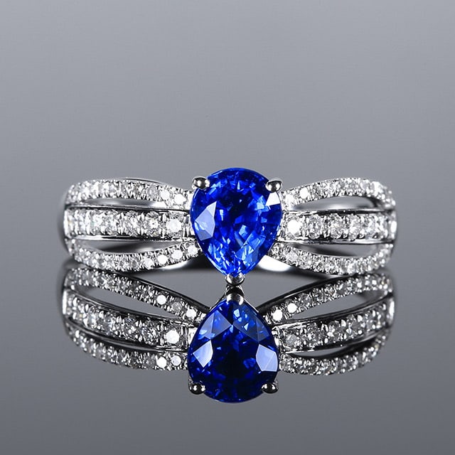 14k Gold 1.34 Ctw Natural Sapphire & Diamond Ring: Ref:230970098 // gold content:14k gold // ring size:7. 25us // // main gemstone:sapphire // shape:pear // carat weight:1. 06ct // color:cornflower blue // treatment:natural // // adjacent gemstone 2