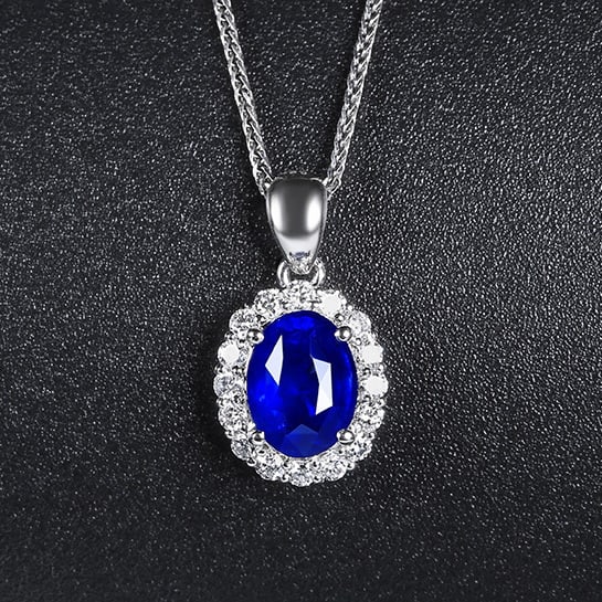 14k Gold 1.21 Ctw Natural Sapphire & Diamond Pendant( Without Chain ): Ref:230970116 // gold content:14k gold // main gemstone:sapphire // shape:oval // carat weight:1. 02ct // color:royal blue // treatment:natural // // adjacent gemstone 2 : diamond // number of