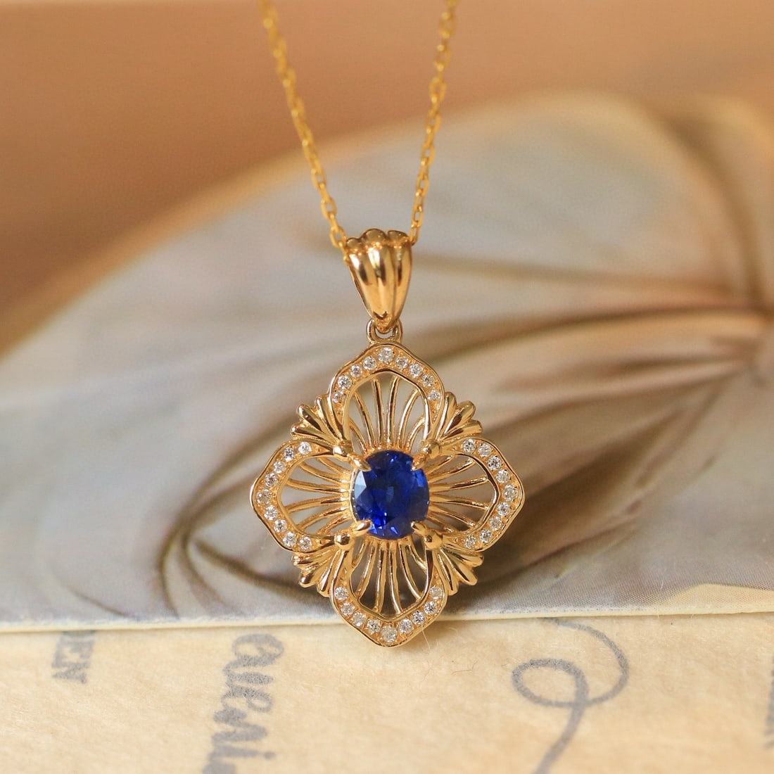 14k Gold 0.58 Ctw Natural Sapphire & Diamond Pendant( Without Chain ): Ref:230970147 // gold content:14k gold // main gemstone:sapphire // shape:oval // carat weight:0. 5ct // color:blue // treatment:natural // // adjacent gemstone 2 : diamond // shape:round // carat wei