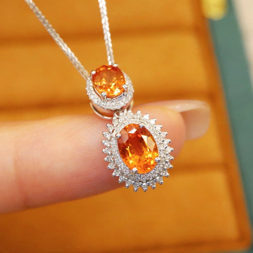 14k Gold 2.22 Ctw Natural Sapphire & Diamond Pendant( Without Chain ): Ref:230970073 // gold content:14k gold // main gemstone:sapphire // shape:oval // carat weight:1. 95ct // color:orange // treatment:natural // // adjacent gemstone 2 : diamond // number of stones:74 /