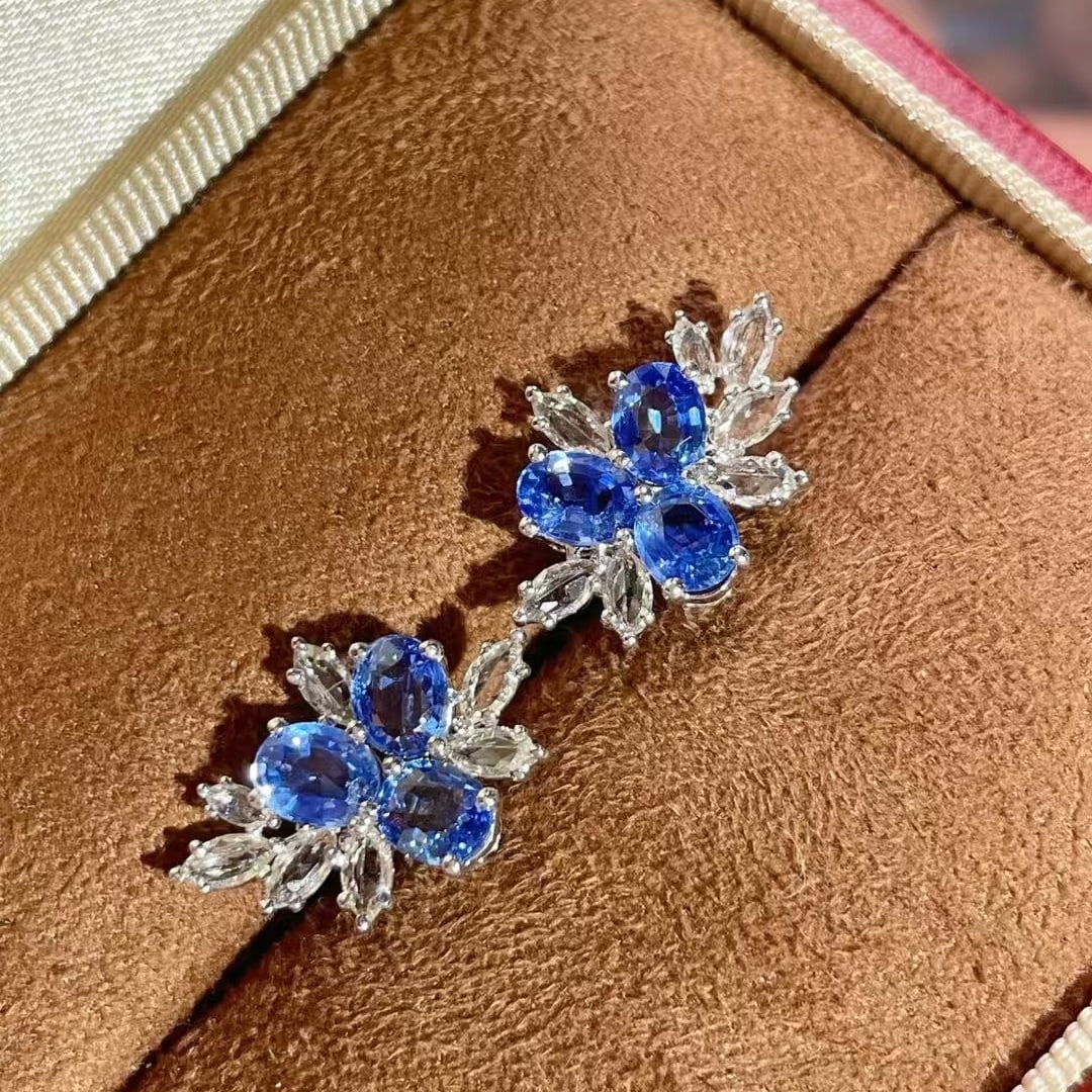 14k Gold 2.6 Ct Natural Sapphire Earrings: Ref:230969254 // gold content:14k gold // main gemstone:sapphire // shape:oval // carat weight:2. 6ct // color:blue // treatment:natural // High Estimate: 5000 Condition: New Low Estimate: 3300