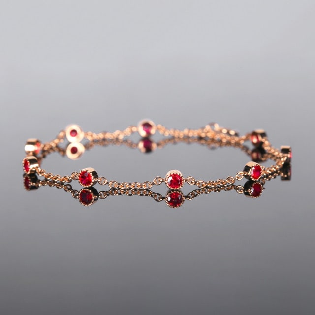14k Gold 0.93 Ct Natural Ruby Bracelet: Ref:230970036 // gold content:14k gold // main gemstone:ruby // shape:round // carat weight:0. 93ct // color:red // treatment:natural // cut grade:g // Condition: New Low Estimate: 3100 High