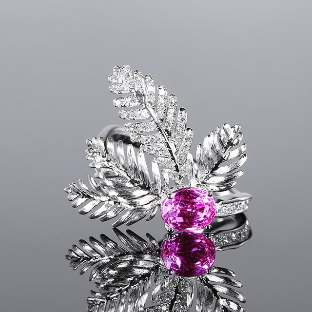 14k Gold 1.71 Ctw Natural Padparadscha Sapphire & Diamond Ring: Ref:230970056 // gold content:14k gold // ring size:7. 25us // // main gemstone:padparadscha sapphire // shape:oval // carat weight:1. 43ct // color:orangish pink // treatment:natural // // adjacent