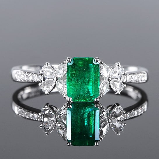 14k Gold 0.81 Ctw Vivid Green Natural Emerald & Diamond Ring: Ref:230970079 // gold content:14k gold // ring size:7. 25us // // main gemstone:emerald // shape:octagonal // carat weight:0. 65ct // color:vivid green // treatment:natural // // adjacent gemstone 2