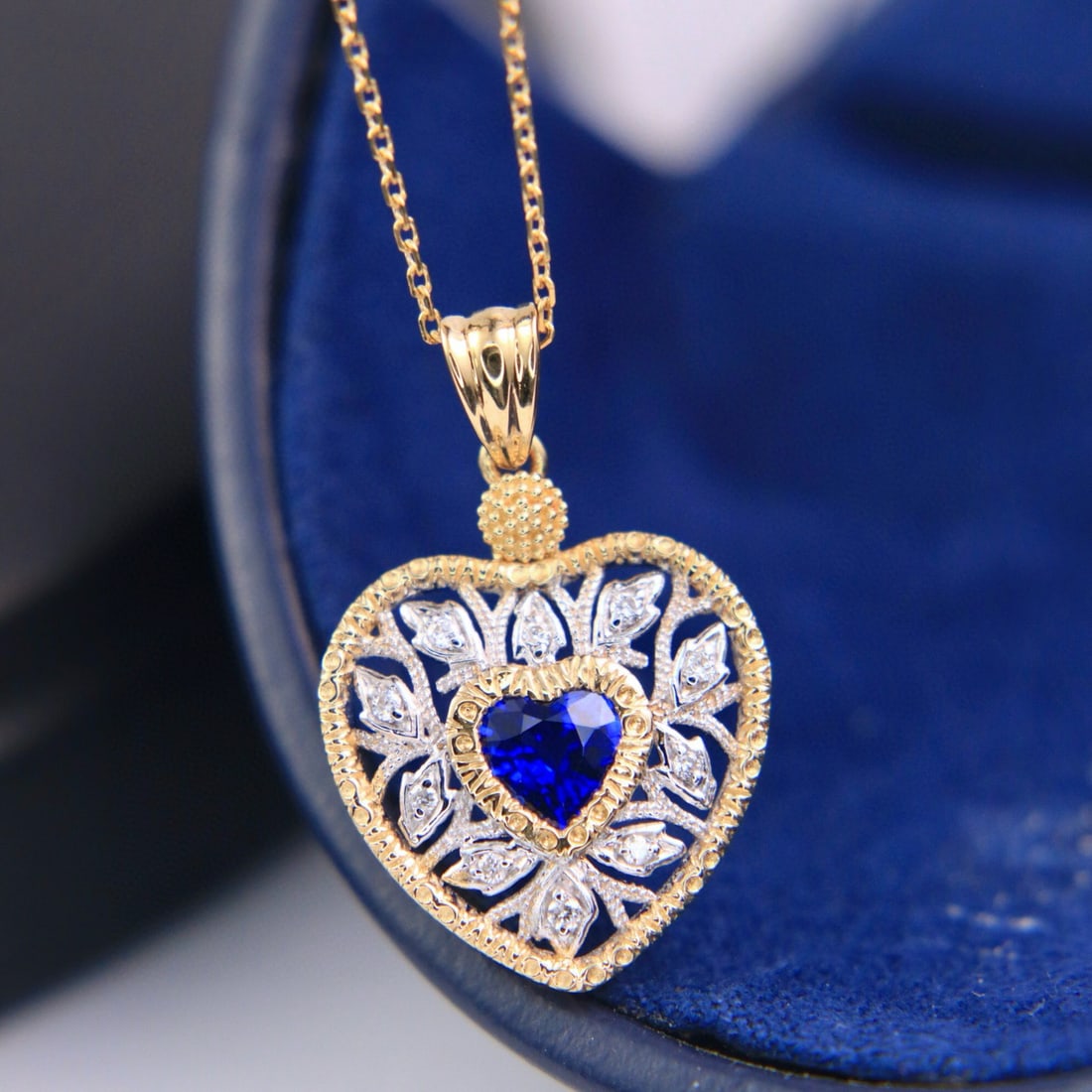 14k Gold 0.59 Ctw Natural Sapphire & Diamond Pendant( Without Chain ): Ref:230970164 // gold content:14k gold // main gemstone:sapphire // shape:heart // carat weight:0. 53ct // color:royal blue // treatment:natural // // adjacent gemstone 2 : diamond // shape:round //