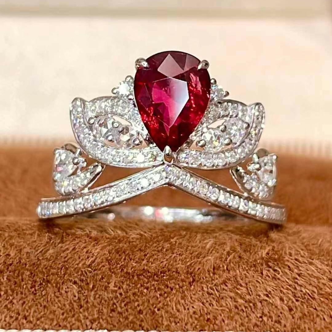 14k Gold 1.42 Ctw Natural Ruby & Diamond Ring: Ref:230970247 // gold content:14k gold // ring size:7. 25us // // main gemstone:ruby // shape:pear // carat weight:1ct // color:pigeonblood red // treatment:natural // // adjacent gemstone 2 :