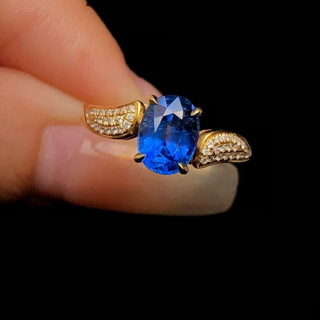14k Gold 1.95 Ctw Natural Sapphire & Diamond Ring: Ref:230971051 // gold content:14k gold // ring size:7. 25us // // main gemstone:sapphire // shape:oval // carat weight:1. 85ct // color:blue // treatment:natural // // adjacent gemstone 2 : diamond
