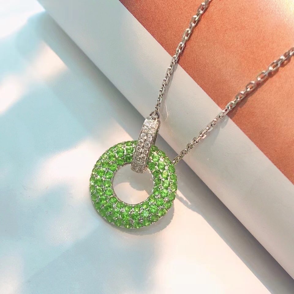14k Gold 0.75 Ctw Natural Tsavorite & Diamond Necklace: Ref:230971057 // gold content:14k gold // main gemstone:tsavorite // shape:round // carat weight:0. 69ct // color:green // treatment:natural // cut grade:g // // adjacent gemstone 2 : diamond //