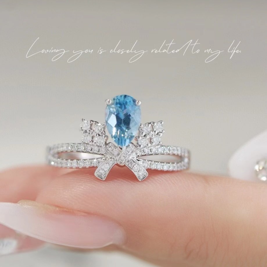 14k Gold 0.68 Ct Natural Aquamarine & Diamond Ring: Ref:230971065 // gold content:14k gold // ring size:7. 25us // // main gemstone:aquamarine // shape:pear // carat weight:0. 68ct // color:santa maria color // treatment:natural // // adjacent