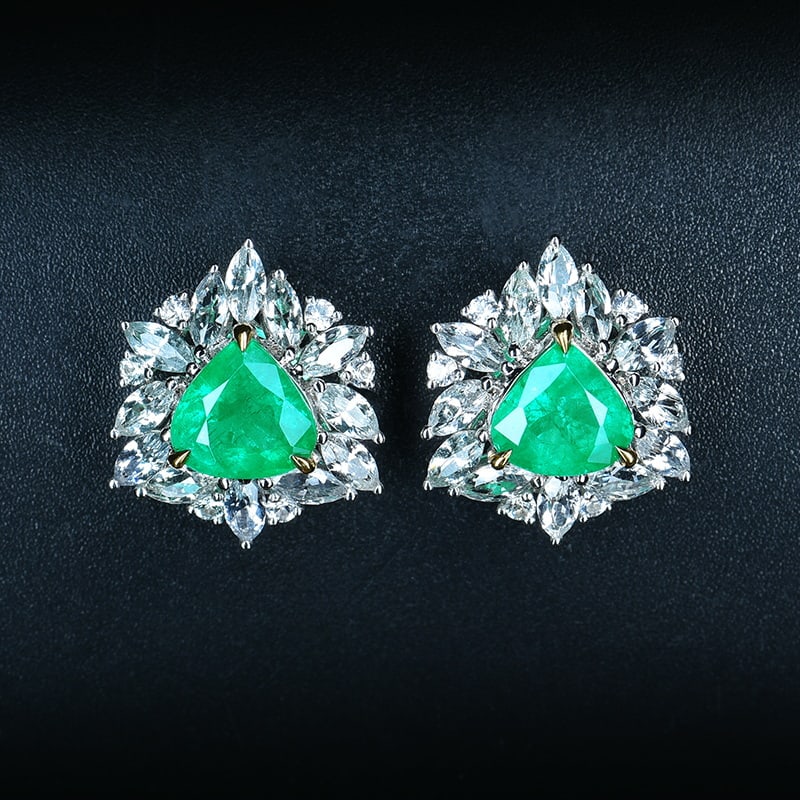 14k Gold 2.12 Ct Vivid Green Natural Emerald & Sapphire Earrings: Ref:230971106 // gold content:14k gold // main gemstone:emerald // shape:pear // carat weight:2. 12ct // color:vivid green // treatment:natural // // adjacent gemstone 2 : sapphire // shape:multiply