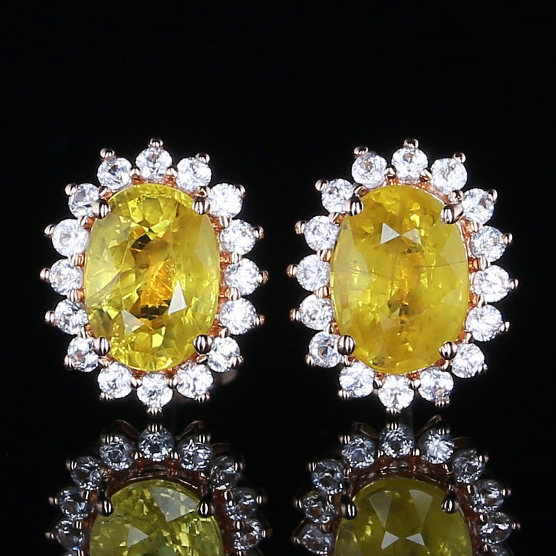 14k Gold 1.56 Ct Natural Sapphire & Diamond Earrings: Ref:230971102 // gold content:14k gold // main gemstone:sapphire // shape:oval // carat weight:1. 56ct // color:yellow // treatment:natural // // adjacent gemstone 2 : diamond // shape:round //