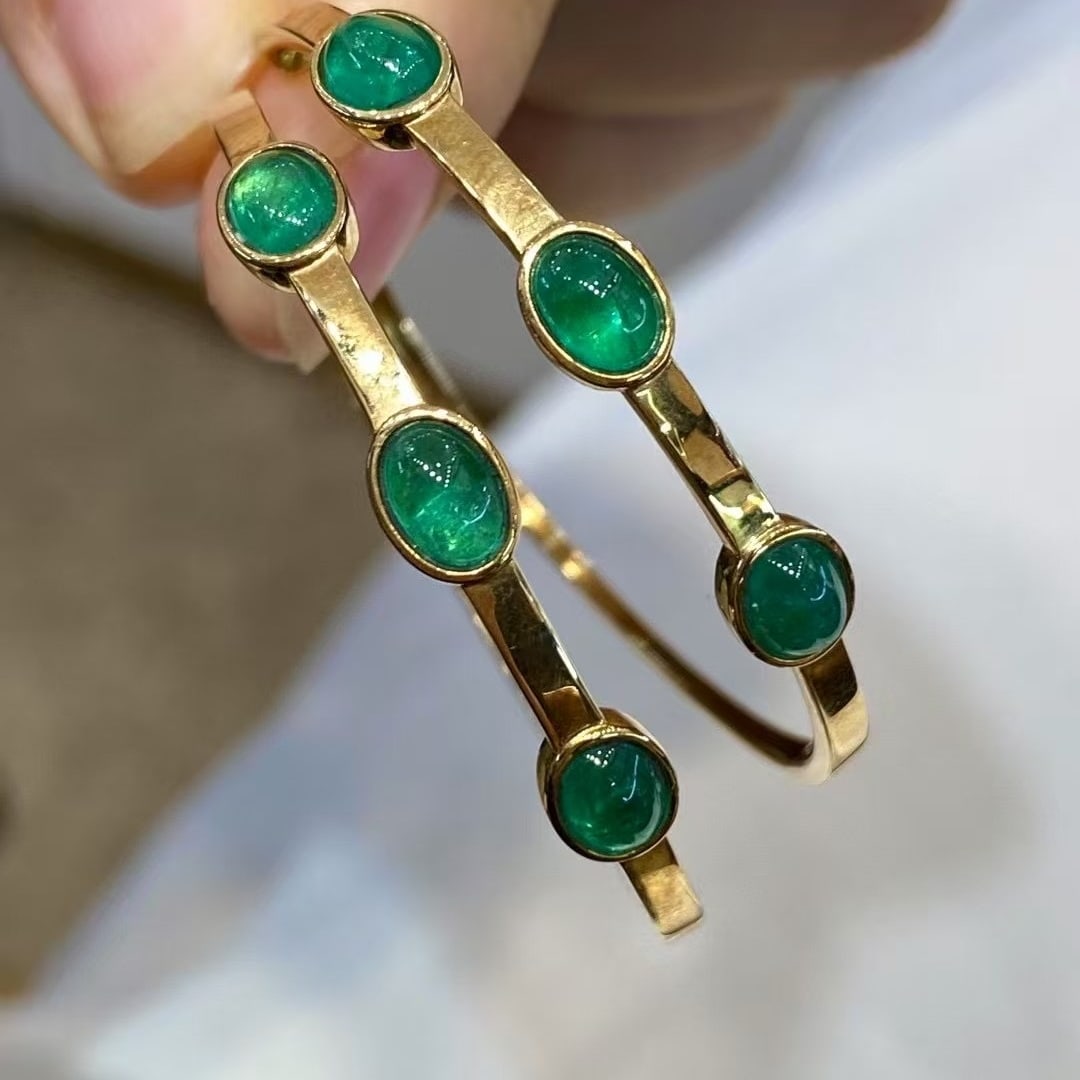 14k Gold 3.17 Ct Natural Emerald Earrings: Ref:230971172 // gold content:14k gold // main gemstone:emerald // shape:oval // carat weight:3. 17ct // color:green // treatment:natural // Low Estimate: 7000 Condition: New High Estimate: 11000
