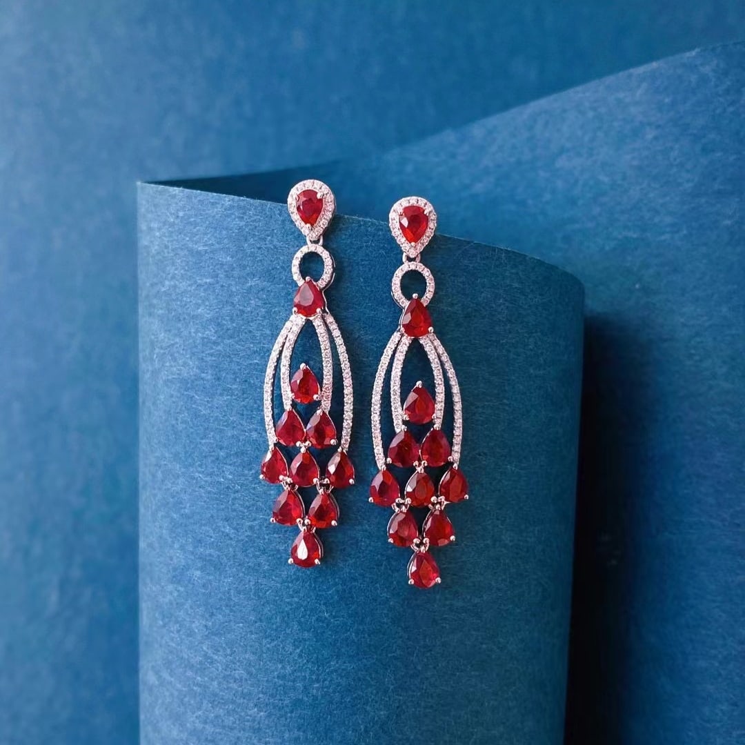 14k Gold 4.46 Ctw Natural Ruby & Diamond Earrings: Ref:230971165 // gold content:14k gold // main gemstone:ruby // shape:pear // carat weight:4. 11ct // color:pigeonblood red // treatment:natural // // adjacent gemstone 2 : diamond // shape:round //