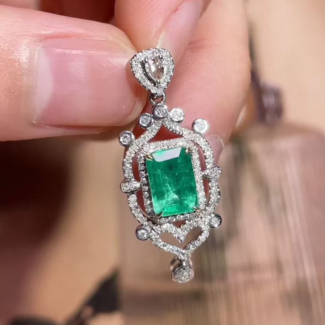 14k Gold 1.09 Ct Vivid Green Natural Emerald & Sapphire & Diamond Pendant( Without Chain ): Ref:230971202 // gold content:14k gold // main gemstone:emerald // shape:octagonal // carat weight:1. 09ct // color:vivid green // treatment:natural // // adjacent gemstone 2 : sapphire // shape:pear