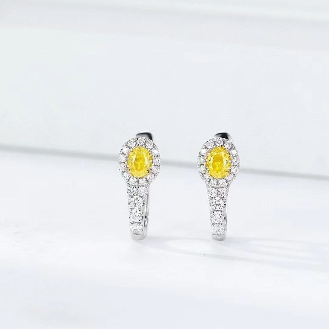 14k Gold 0.42 Ctw Natural Yellow Diamond & Diamond Earrings: Ref:230971209 // gold content:14k gold // main gemstone:yellow diamond // shape:oval // carat weight:0. 22ct // color:yellow // treatment:natural // // adjacent gemstone 2 : diamond // shape:round //