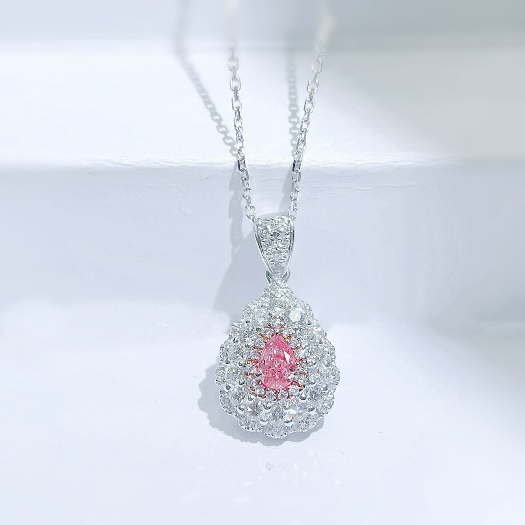 14k Gold 0.62 Ctw Natural Pink Diamond & Diamond Necklace: Ref:230972006 // gold content:14k gold // main gemstone:pink diamond // shape:pear // carat weight:0. 16ct // color:pink // treatment:natural // // adjacent gemstone 2 : diamond // shape:round //