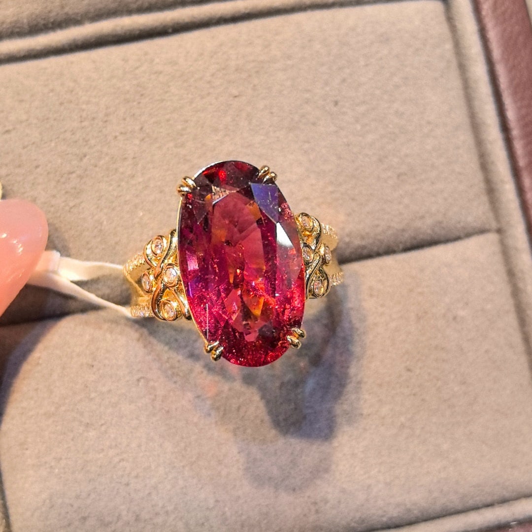 14k Gold 8.17 Ctw Natural Tourmaline & Diamond Ring: Ref:230971250 // gold content:14k gold // ring size:7. 25us // // main gemstone:tourmaline // shape:oval // carat weight:8. 03ct // color:red // treatment:natural // // adjacent gemstone 2 : diamond