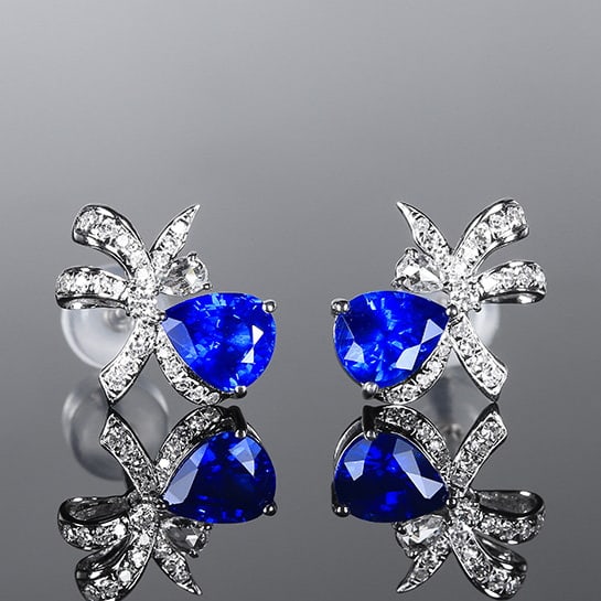 14k Gold 1.79 Ctw Natural Sapphire & Diamond Earrings: Ref:230972023 // gold content:14k gold // main gemstone:sapphire // shape:pear // carat weight:1. 55ct // color:royal blue // treatment:natural // // adjacent gemstone 2 : diamond // number of