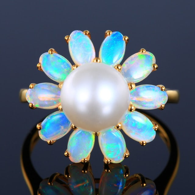 14k Gold 5.41 Ctw Natural Opal & Pearl Ring: Ref:230972059 // gold content:14k gold // ring size:7. 25us // // main gemstone:opal // shape:oval // carat weight:1. 62ct // color:white // treatment:natural // // adjacent gemstone 2 : pearl //