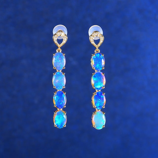 14k Gold 3.41 Ctw Natural Opal & Diamond Earrings: Ref:230972113 // gold content:14k gold // main gemstone:opal // shape:oval // carat weight:3. 36ct // color:white // treatment:natural // // adjacent gemstone 2 : diamond // number of stones:18 //