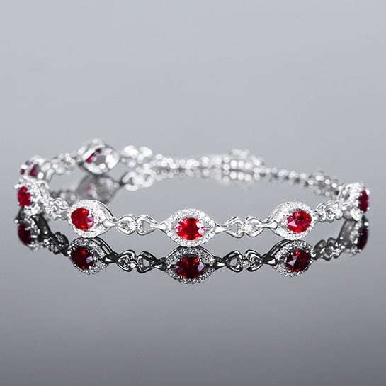 14k Gold 2.26 Ctw Natural Ruby & Diamond Bracelet: Ref:230972072 // gold content:14k gold // main gemstone:ruby // shape:oval // carat weight:1. 80ct // color:pigeonblood red // treatment:natural // // adjacent gemstone 2 : diamond // number of