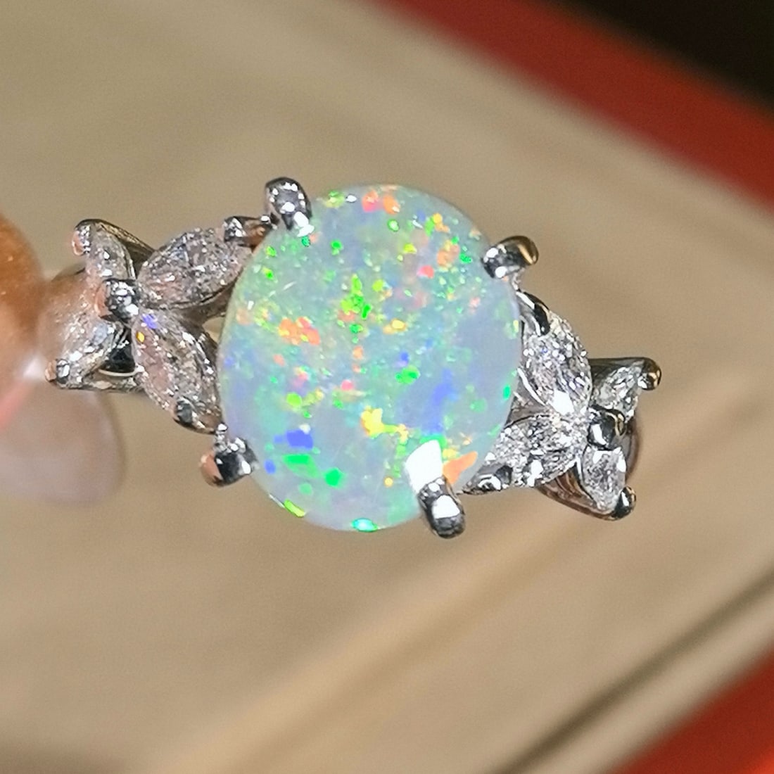 14k Gold 2.45 Ctw Natural Opal & Diamond Ring: Ref:230972209 // gold content:14k gold // ring size:7. 25us // // main gemstone:opal // shape:oval // carat weight:2ct // color:white // treatment:natural // // adjacent gemstone 2 : diamond //
