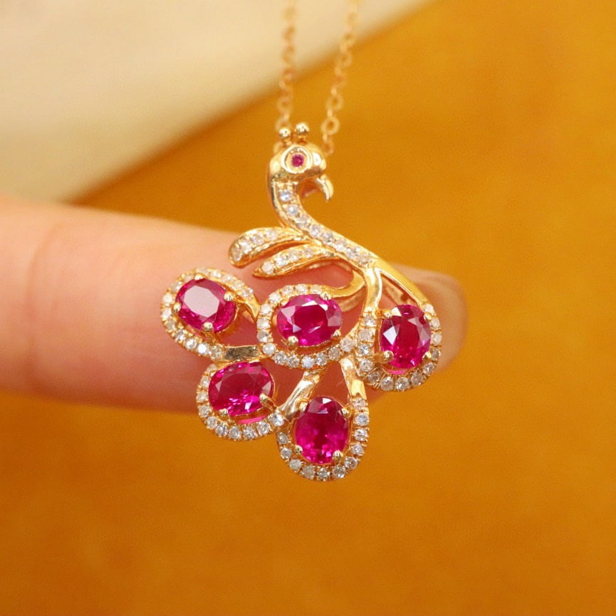 14k Gold 1.51 Ctw Natural Ruby & Diamond Pendant( Without Chain ): Ref:230972362 // gold content:14k gold // main gemstone:ruby // shape:oval // carat weight:1. 28ct // color:red // treatment:natural // // adjacent gemstone 2 : diamond // number of stones:78 //