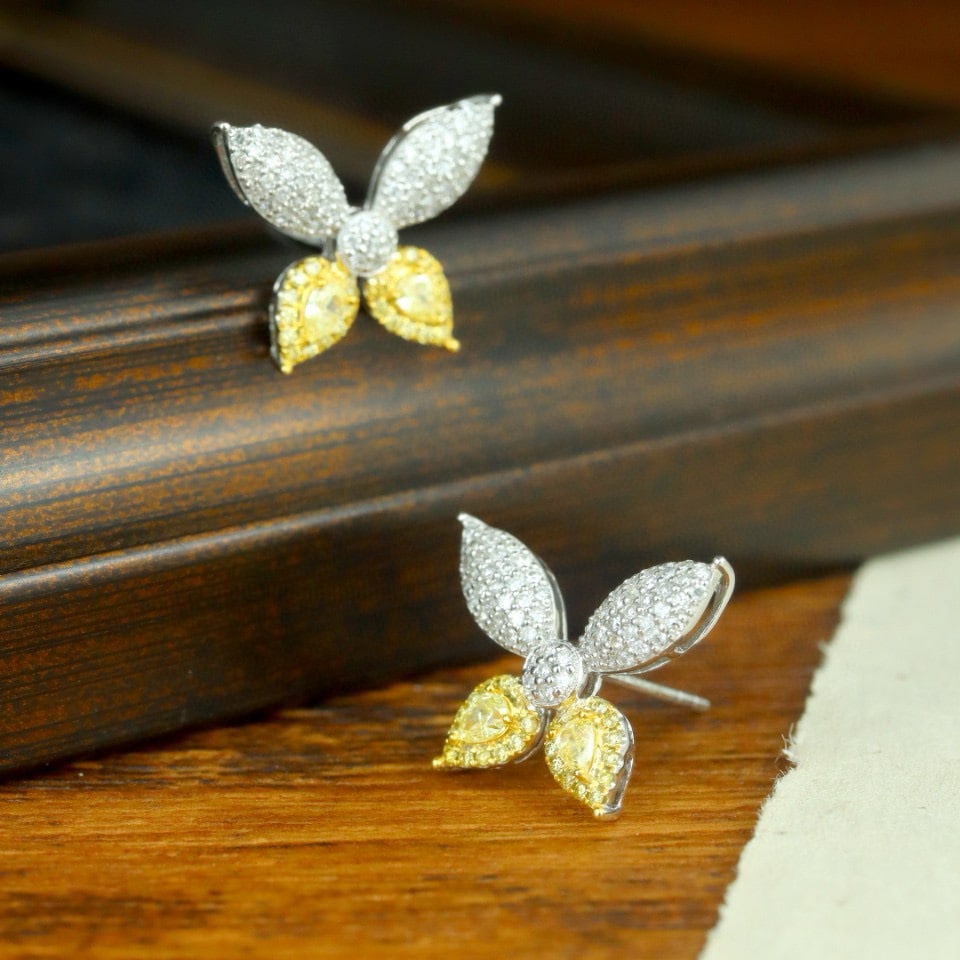 14k Gold 0.78 Ctw Natural Yellow Diamond & Diamond Earrings: Ref:230972439 // gold content:14k gold // main gemstone:yellow diamond // shape:pear // carat weight:0. 28ct // color:yellow // treatment:natural // // adjacent gemstone 2 : diamond // shape:round //