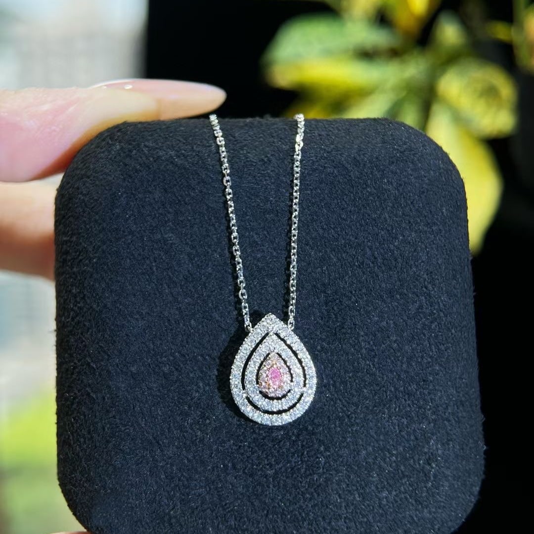 14k Gold 0.25 Ctw Natural Pink Diamond & Diamond Necklace: Ref:230972379 // gold content:14k gold // main gemstone:pink diamond // shape:pear // carat weight:0. 03ct // color:pink // treatment:natural // // adjacent gemstone 2 : diamond // shape:round //