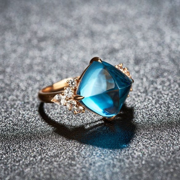 14k Gold 10.29 Ctw Natural Topaz & Sapphire Ring: Ref:230972450 // gold content:14k gold // ring size:7. 25us // // main gemstone:topaz // shape:suger-loaf // carat weight:9. 66ct // color:blue // treatment:natural // // adjacent gemstone 2 :