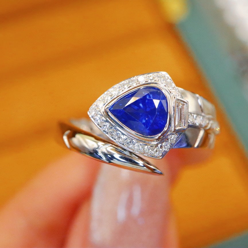 14k Gold 1.24 Ctw Natural Sapphire & Diamond Ring: Ref:230972447 // gold content:14k gold // ring size:7. 25us // // main gemstone:sapphire // shape:pear // carat weight:1. 06ct // color:royal blue // treatment:natural // // adjacent gemstone 2 :
