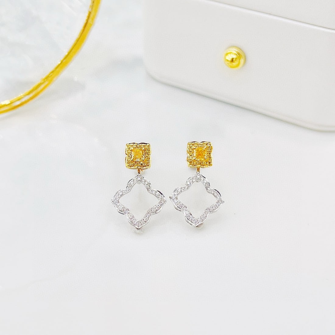 14k Gold 0.56 Ctw Natural Yellow Diamond & Diamond Earrings: Ref:230973014 // gold content:14k gold // main gemstone:yellow diamond // shape:cushion // carat weight:0. 32ct // color:yellow // treatment:natural // // adjacent gemstone 2 : diamond // shape:round