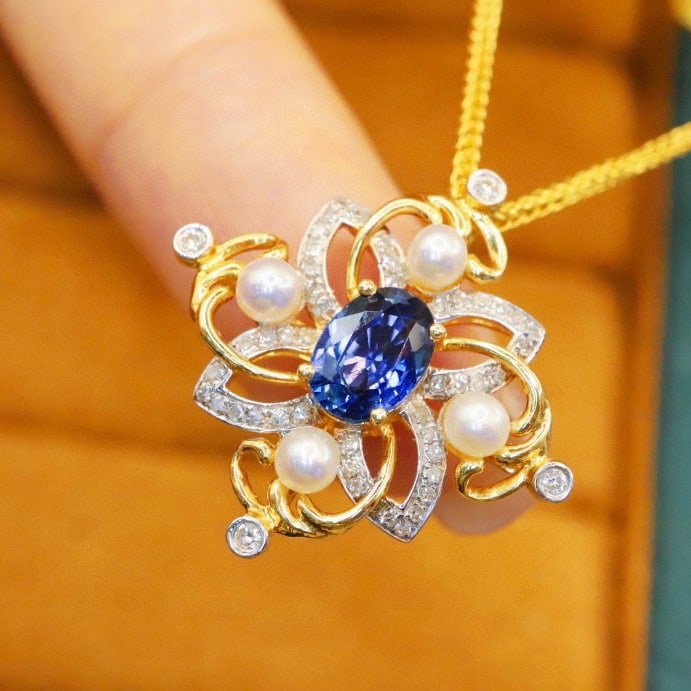 14k Gold 1.12 Ctw Natural Sapphire & Diamond Pendant( Without Chain ): Ref:230972445 // gold content:14k gold // main gemstone:sapphire // shape:oval // carat weight:0. 95ct // color:blue // treatment:natural // // adjacent gemstone 2 : diamond // number of stones:48 //