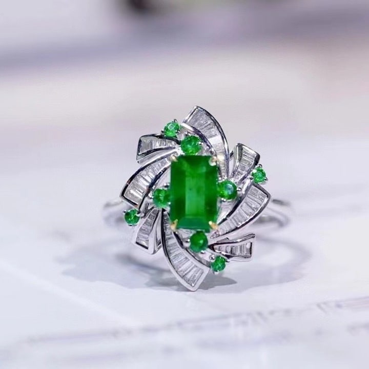 14k Gold 1.22 Ctw Vivid Green Natural Emerald & Diamond Ring: Ref:230973093 // gold content:14k gold // ring size:7. 25us // // main gemstone:emerald // shape:octagonal // carat weight:0. 86ct // color:vivid green // treatment:natural // // adjacent gemstone 2