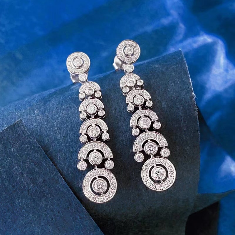 14k Gold 1 Ct Natural H Diamond Earrings: Ref:230973023 // gold content:14k gold // main gemstone:diamond // shape:round // carat weight:1ct // clarity grade:vs-si // color:h // treatment:natural // cut grade:g // High Estimate: 6300