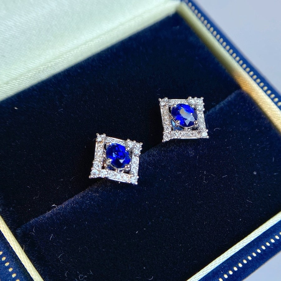 14k Gold 1.05 Ctw Natural Sapphire & Diamond Earrings: Ref:230973074 // gold content:14k gold // main gemstone:sapphire // shape:oval // carat weight:0. 81ct // color:royal blue // treatment:natural // // adjacent gemstone 2 : diamond // shape:round //