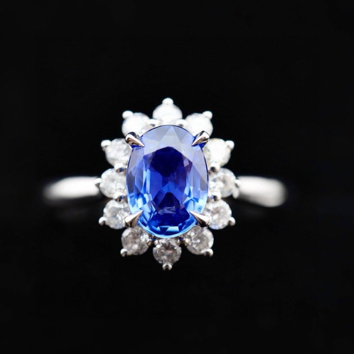14k Gold 1.23 Ctw Natural Sapphire & Diamond Ring: Ref:230973128 // gold content:14k gold // ring size:7. 25us // // main gemstone:sapphire // shape:oval // carat weight:0. 9ct // color:cornflower blue // treatment:natural // // adjacent gemstone 2 :
