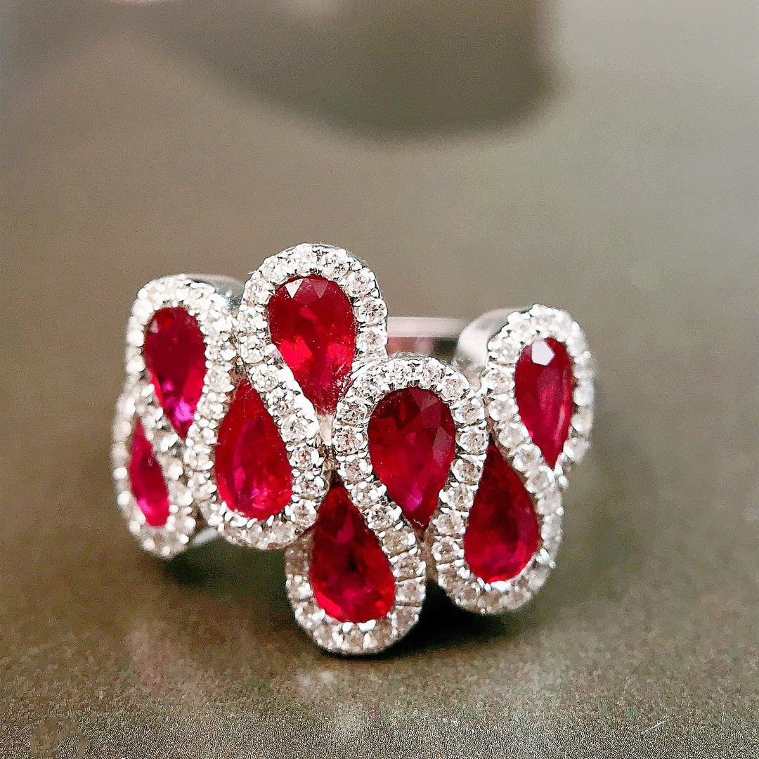 14k Gold 2.52 Ctw Natural Ruby & Diamond Ring: Ref:230973096 // gold content:14k gold // ring size:7. 25us // // main gemstone:ruby // shape:pear // carat weight:2. 20ct // color:red // treatment:natural // // adjacent gemstone 2 : diamond //
