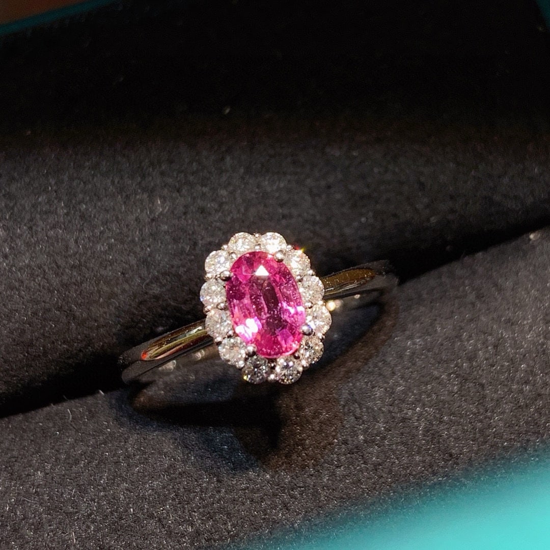 14k Gold 1.14 Ctw Natural Padparadscha Sapphire & Diamond Ring: Ref:230973112 // gold content:14k gold // ring size:7. 25us // // main gemstone:padparadscha sapphire // shape:oval // carat weight:0. 9ct // color:orangish pink // treatment:natural // // adjacent