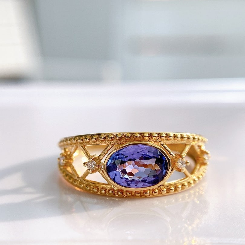 14k Gold 1.13 Ct Natural Tanzanite & Diamond Ring: Ref:230973212 // gold content:14k gold // ring size:7. 25us // // main gemstone:tanzanite // shape:oval // carat weight:1. 13ct // color:blue // treatment:natural // // adjacent gemstone 2 : diamond /