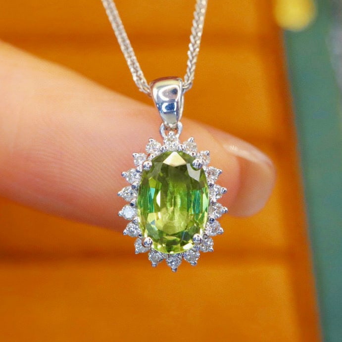 14k Gold 1.70 Ctw Natural Sapphire & Diamond Pendant( Without Chain ): Ref:230974123 // gold content:14k gold // main gemstone:sapphire // shape:oval // carat weight:1. 52ct // color:green // treatment:natural // // adjacent gemstone 2 : diamond // number of stones:18 //