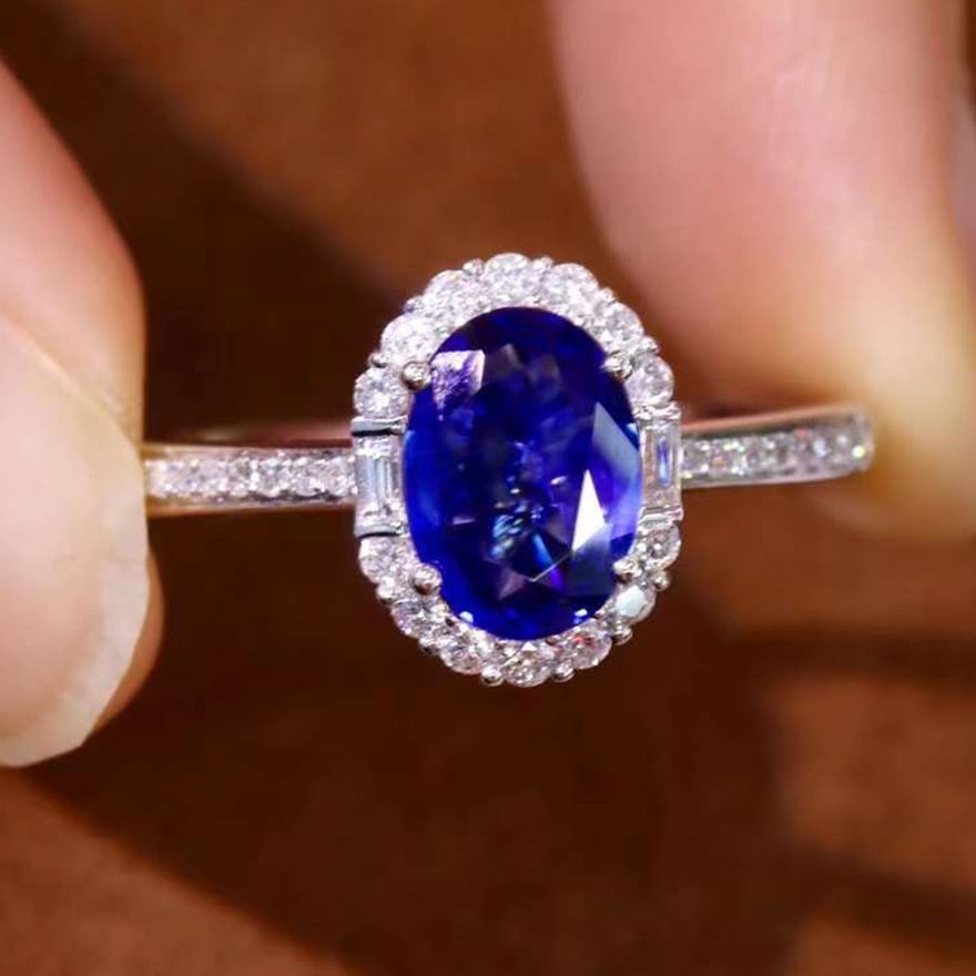 14k Gold 1.25 Ctw Vivid Blue Natural Sapphire & Diamond Ring: Ref:230974105 // gold content:14k gold // ring size:7. 25us // // main gemstone:sapphire // shape:oval // carat weight:1. 0ct // color:vivid blue // treatment:natural // // adjacent gemstone 2 :
