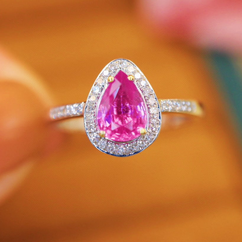 14k Gold 1.07 Ctw Natural Padparadscha Sapphire & Diamond Ring: Ref:230974102 // gold content:14k gold // ring size:7. 25us // // main gemstone:padparadscha sapphire // shape:pear // carat weight:0. 9ct // color:orangish pink // treatment:natural // // adjacent