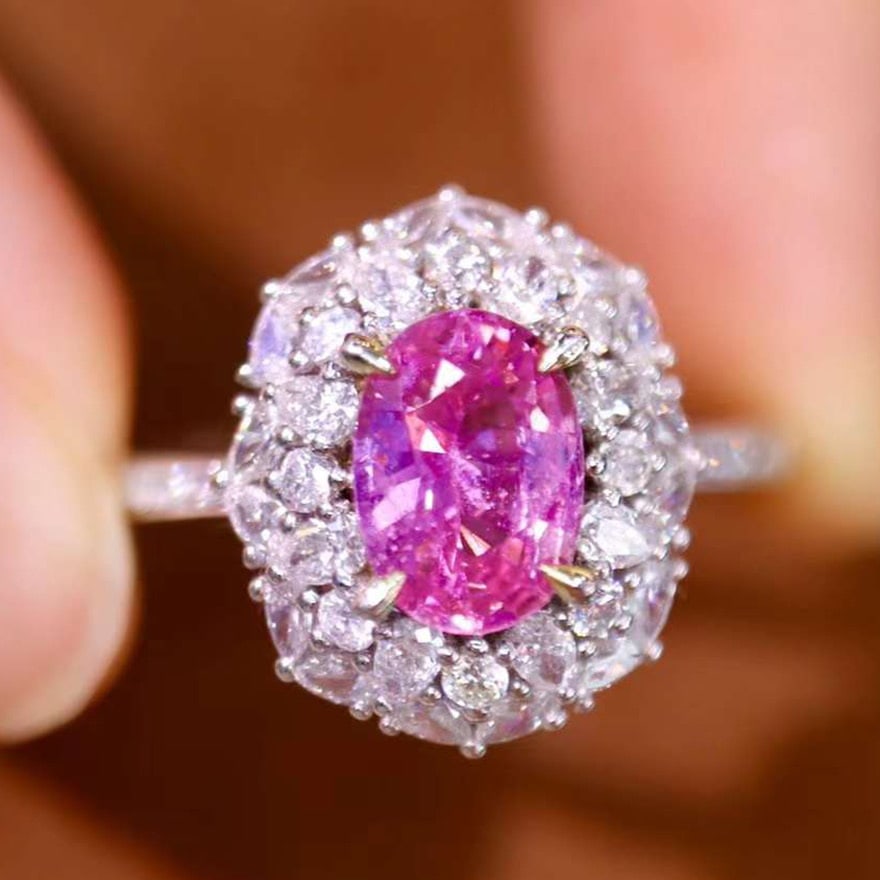 14k Gold 2.16 Ctw Natural Padparadscha Sapphire & Diamond Ring: Ref:230974283 // gold content:14k gold // ring size:7. 25us // // main gemstone:padparadscha sapphire // shape:oval // carat weight:1. 33ct // color:orangish pink // treatment:natural // // adjacent
