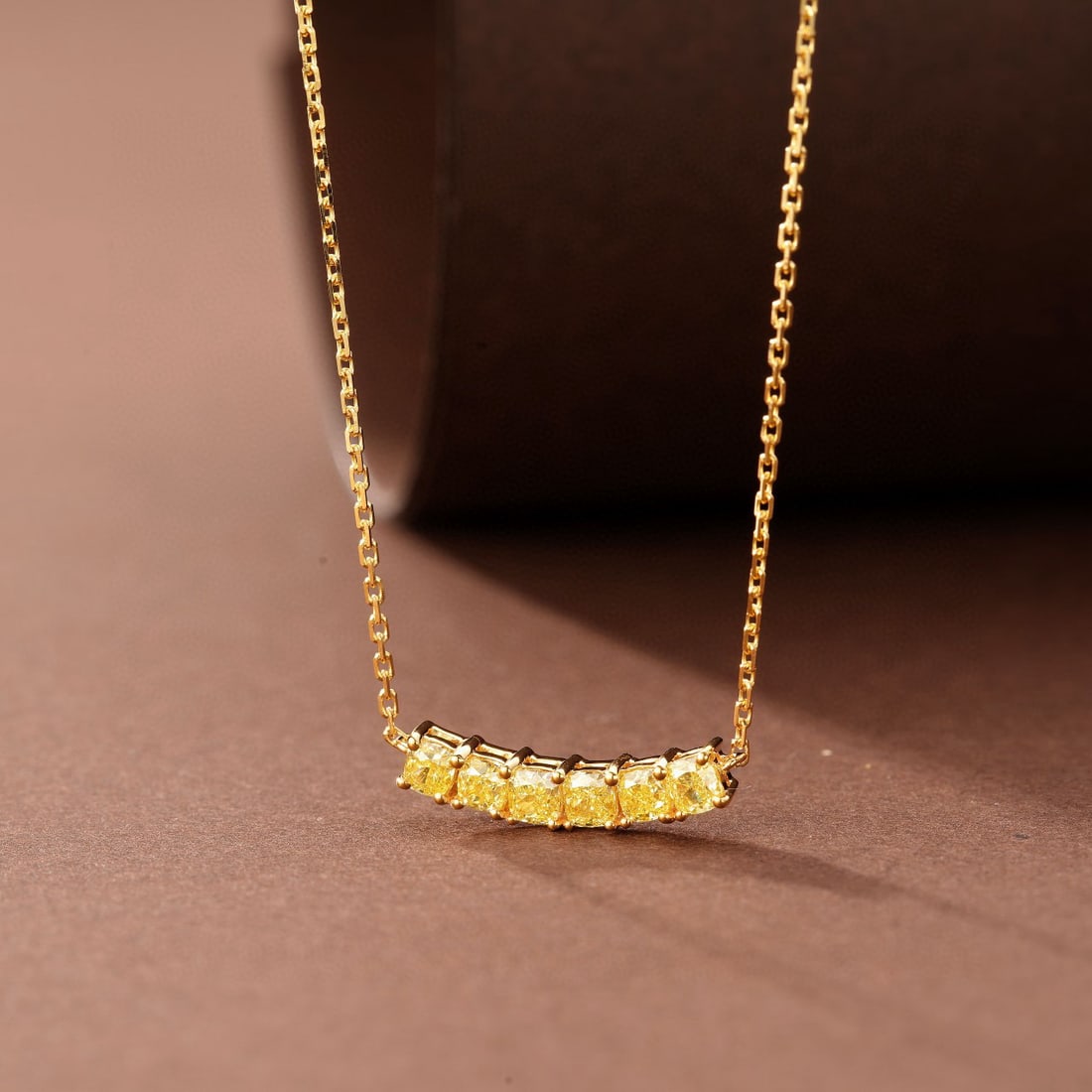 14k Gold 0.85 Ct Natural Yellow Diamond Necklace: Ref:230974277 // gold content:14k gold // main gemstone:yellow diamond // shape:cushion // carat weight:0. 85ct // color:yellow // treatment:natural // High Estimate: 5000 Low Estimate: 3300