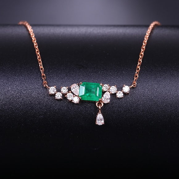 14k Gold 0.68 Ctw Vivid Green Natural Emerald & Diamond Necklace: Ref:230974334 // gold content:14k gold // main gemstone:emerald // shape:octagonal // carat weight:0. 41ct // color:vivid green // treatment:natural // // adjacent gemstone 2 : diamond // shape:multip